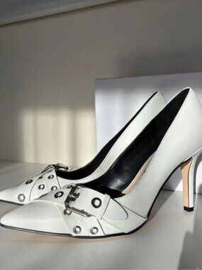 white leather pumps with buckles detail